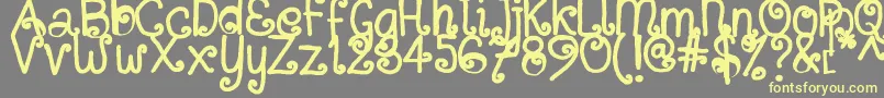 SitujuhHand Font – Yellow Fonts on Gray Background