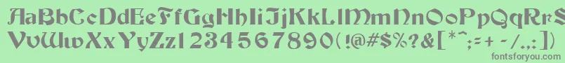 フォントTutbur – 緑の背景に灰色の文字