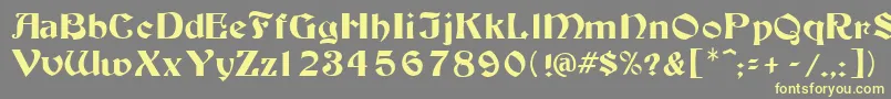 Tutbur Font – Yellow Fonts on Gray Background