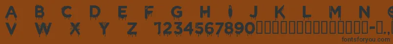 CfhalloweenRegular Font – Black Fonts on Brown Background