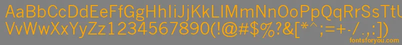 フォントNwgthc – オレンジの文字は灰色の背景にあります。