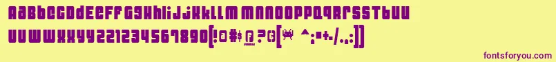 DynomiteThin-Schriftart – Violette Schriften auf gelbem Hintergrund