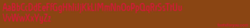 フォントAbsolutProBookcondensed – 赤い文字が茶色の背景にあります。