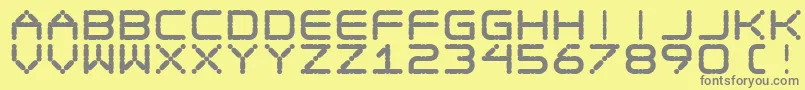 フォントEgo Trip Fat – 黄色の背景に灰色の文字