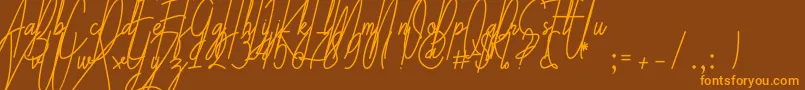 Galliyani-Schriftart – Orangefarbene Schriften auf braunem Hintergrund