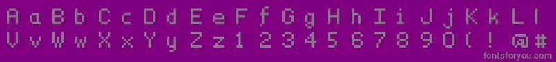 フォントDymsmall – 紫の背景に灰色の文字