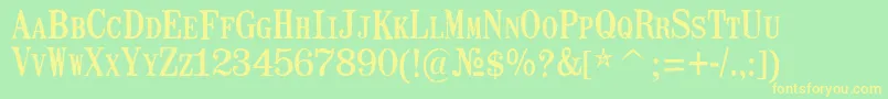 MailartrubberstampRegular Font – Yellow Fonts on Green Background