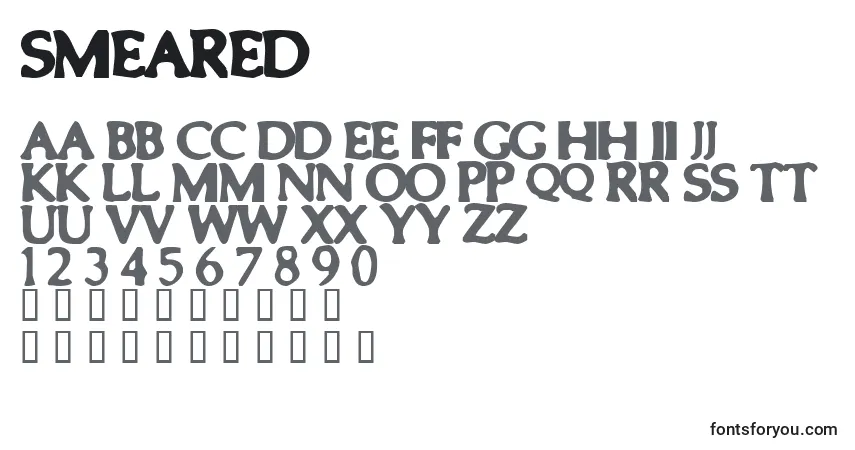 Czcionka Smeared – alfabet, cyfry, specjalne znaki