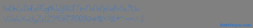 フォントKindness – 灰色の背景に青い文字