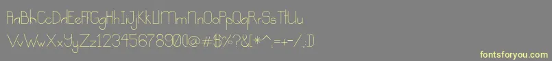 Kindness Font – Yellow Fonts on Gray Background