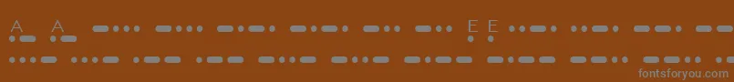 Fonte MatchMorseShareware – fontes cinzas em um fundo marrom