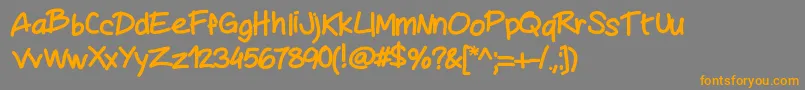 フォントMywriting – オレンジの文字は灰色の背景にあります。