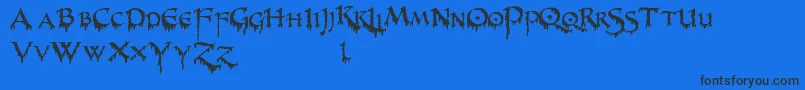 PrUncialCreepy Font – Black Fonts on Blue Background