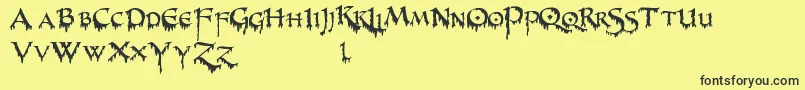 PrUncialCreepy Font – Black Fonts on Yellow Background