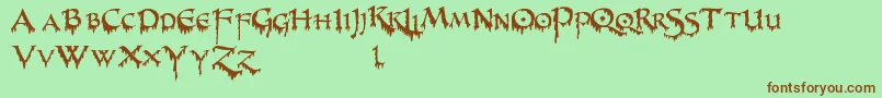 PrUncialCreepy Font – Brown Fonts on Green Background