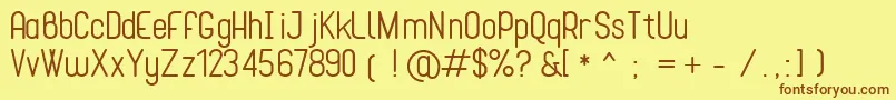Cona Font – Brown Fonts on Yellow Background