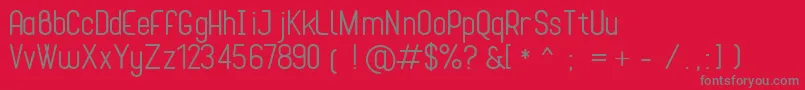 フォントCona – 赤い背景に灰色の文字