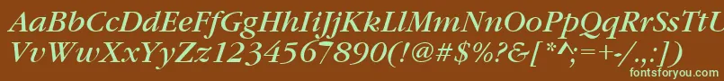 フォントGaramonditcteeItalic – 緑色の文字が茶色の背景にあります。