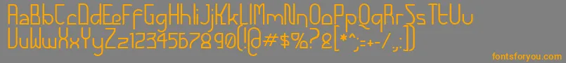フォントFuturexAlternatetc – オレンジの文字は灰色の背景にあります。
