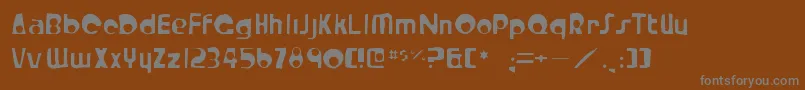 Crystalradiokitgaunt-fontti – harmaat kirjasimet ruskealla taustalla
