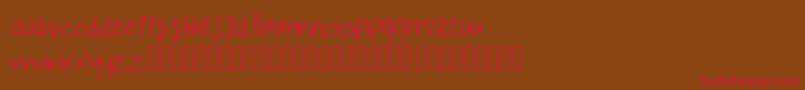 Czcionka RcMyDreamFont – czerwone czcionki na brązowym tle