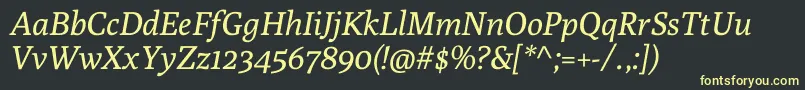 フォントPolyItalic – 黒い背景に黄色の文字