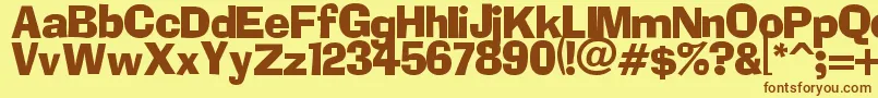 フォントDolor – 茶色の文字が黄色の背景にあります。