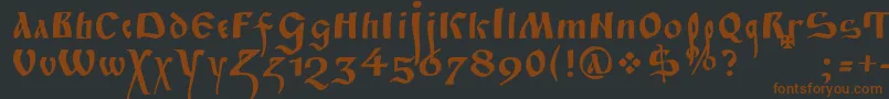 FitaPoluustav-fontti – ruskeat fontit mustalla taustalla