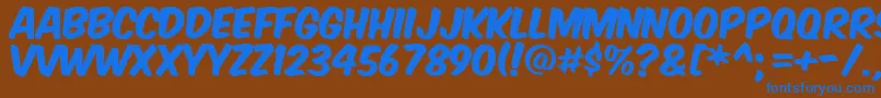 Komtita Font – Blue Fonts on Brown Background
