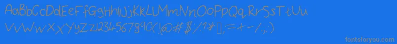 フォントBryonysHandwritingThin – 青い背景に灰色の文字