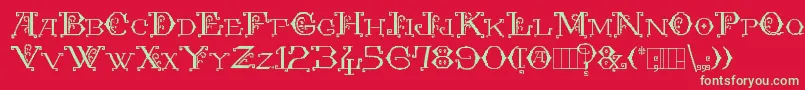 Fonte KingthingsEmbroidery – fontes verdes em um fundo vermelho