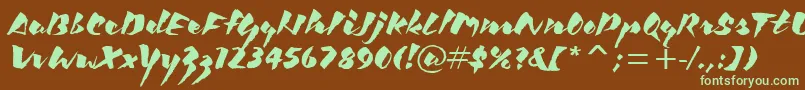 KickItcTt Font – Green Fonts on Brown Background