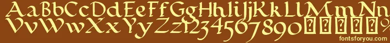 CalligraphyPen-fontti – keltaiset fontit ruskealla taustalla
