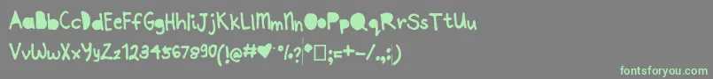 Joannepapercut Font – Green Fonts on Gray Background