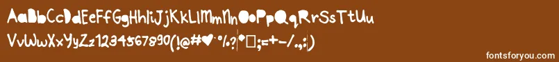 Joannepapercut Font – White Fonts on Brown Background