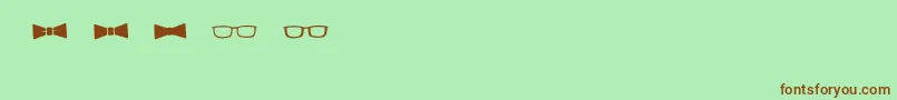 フォントBmdGeektasticAccessories – 緑の背景に茶色のフォント