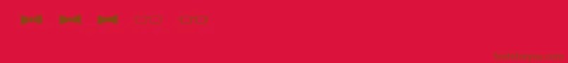BmdGeektasticAccessories Font – Brown Fonts on Red Background