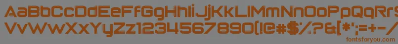 フォントReturnOfTheGrid – 茶色の文字が灰色の背景にあります。