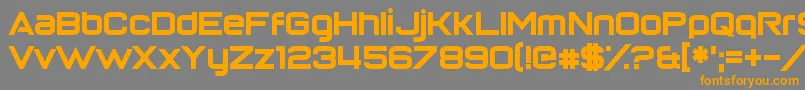 フォントReturnOfTheGrid – オレンジの文字は灰色の背景にあります。