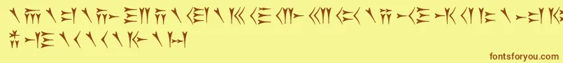 Fonte Oldpersiancuneiform – fontes marrons em um fundo amarelo