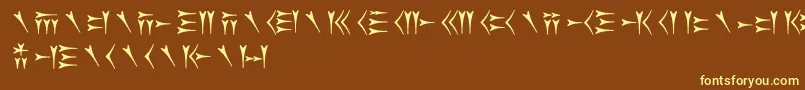 Fonte Oldpersiancuneiform – fontes amarelas em um fundo marrom