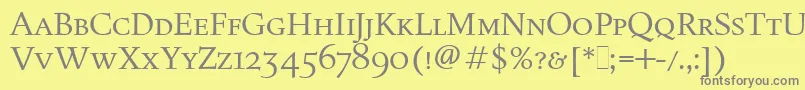 フォントFiguralSmallCapsLetPlain.1.0 – 黄色の背景に灰色の文字