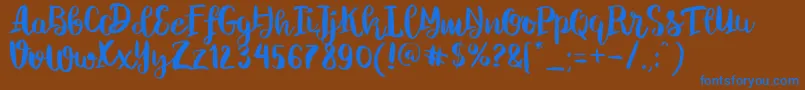 Saiba mais sobre a fonte ChelseaBrushScript Fonte ChelseaBrushScript – fontes azuis em um fundo marrom