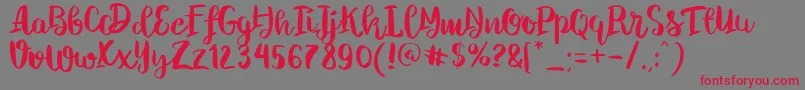 フォントChelseaBrushScript – 赤い文字の灰色の背景