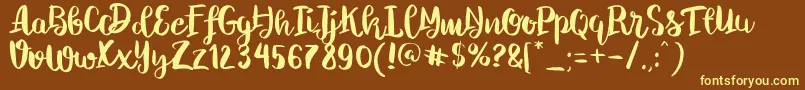 ChelseaBrushScript Font – Yellow Fonts on Brown Background