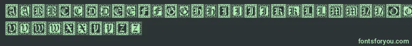 フォントXmascaps – 黒い背景に緑の文字