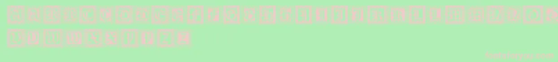 Xmascaps Font – Pink Fonts on Green Background