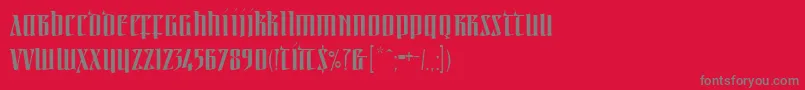 フォントLinotypeirishtext – 赤い背景に灰色の文字