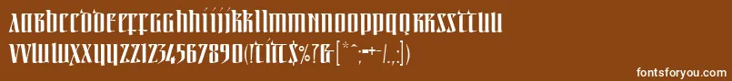 Czcionka Linotypeirishtext – białe czcionki na brązowym tle