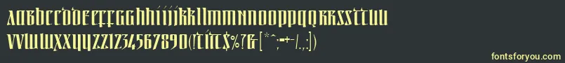 Linotypeirishtext Font – Yellow Fonts on Black Background